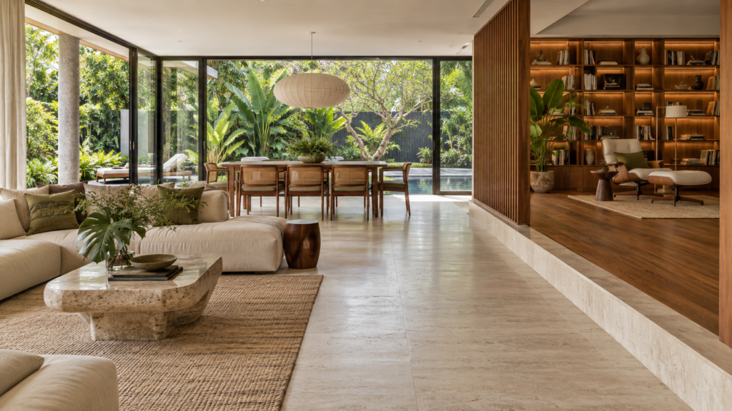 Landed living space with stone flooring and a timber-floored reading area